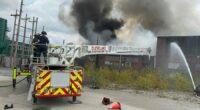 Bullets fly as firefighters battle blaze at metal recycling facility