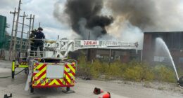 Bullets fly as firefighters battle blaze at metal recycling facility