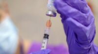 CDC panel votes to change recommendations for COVID vaccines