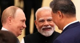 Car rides and hand holding: Putin, Modi and Xi send Trump a pointed message