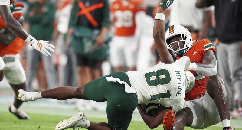 Carson Beck, Mark Fletcher Jr. lead the way as No. 5 Miami rolls past No. 18 USF, 49-12