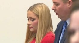 Cheerleader in court in full-glam after 'hiding dead baby in closet'
