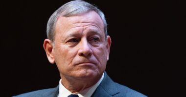 Chief Justice John Roberts keeps in place President Donald Trump funding freeze that threatens billions in foreign aid