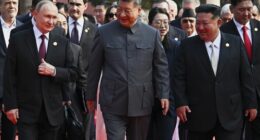 Front from left, Russian President Vladimir Putin, Chinese President Xi Jinping and North Korean leader Kim Jong Un arrive at a military parade.