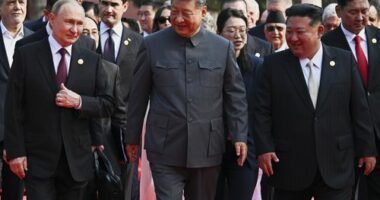 Front from left, Russian President Vladimir Putin, Chinese President Xi Jinping and North Korean leader Kim Jong Un arrive at a military parade.