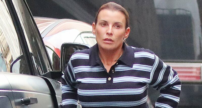Coleen Rooney unbuttons her jeans after leaving Indian restaurant