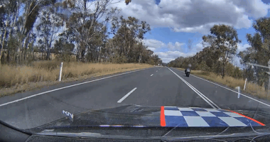 Dashcam footage shows motorcyclist being caught doing 'phenomenal speed'