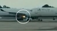 Delta plane engine catches fire on airport runway
