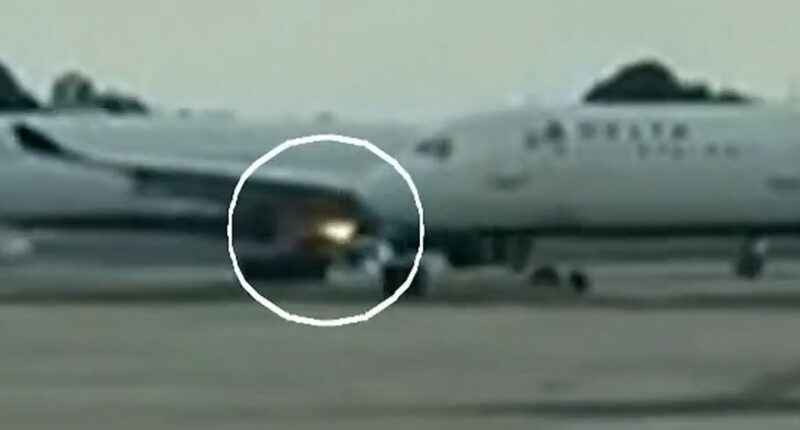 Delta plane engine catches fire on airport runway