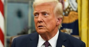 President Donald Trump signs executive orders in the Oval Office of the White House, Jan. 20, 2025, in Washington.