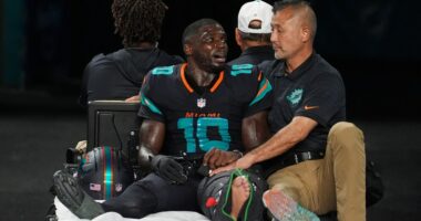 Dolphins' Tyreek Hill carted off field and taken to hospital with serious left leg injury
