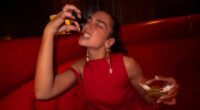 Dua Lipa playfully poses for snaps and showcases impressive yoga moves