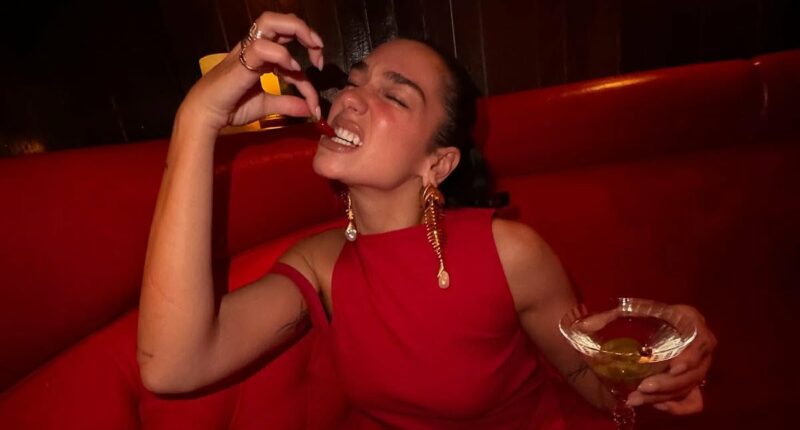 Dua Lipa playfully poses for snaps and showcases impressive yoga moves