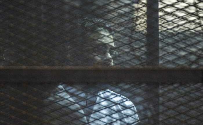 Egypt announces pardon for top activist who's spent 6 years behind bars