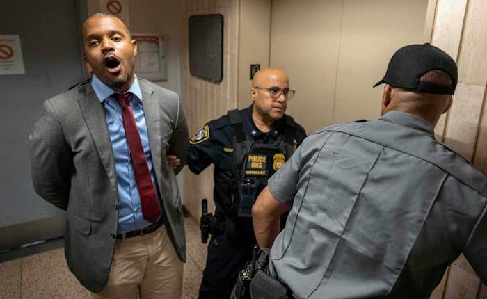 Elected officials and dozens of protesters are arrested at Manhattan immigration holding facility