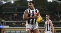Ex-Collingwood boss lashes out at Adelaide fans with a telling response after spectators booed Isaac Quaynor - as Izak Rankine is spotted at the Adelaide Oval
