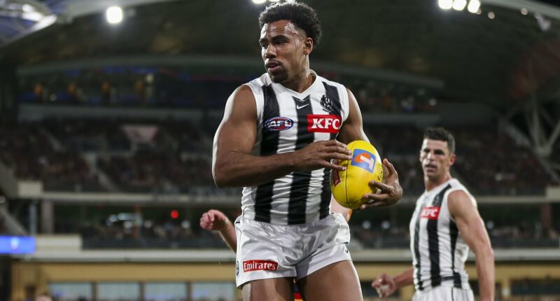 Ex-Collingwood boss lashes out at Adelaide fans with a telling response after spectators booed Isaac Quaynor - as Izak Rankine is spotted at the Adelaide Oval
