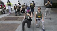 FBI fires agents over kneeling protest photos in sweeping crackdown