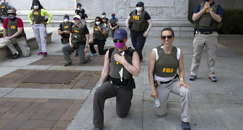 FBI fires agents over kneeling protest photos in sweeping crackdown