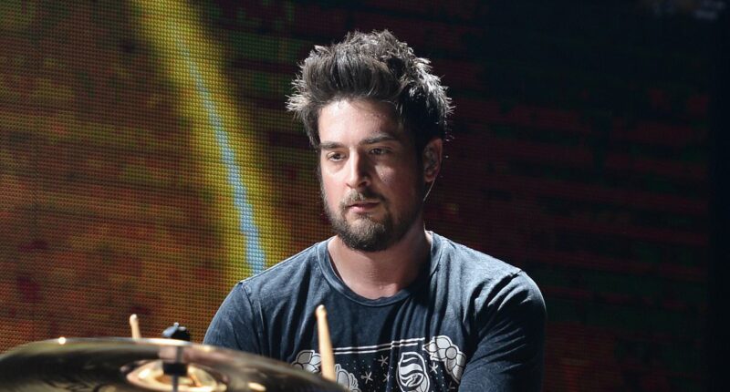 Famous rock band faces crisis as star drummer forced to quit