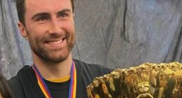 Footy fan cops MONSTER ban after 'highly homophobic' slur directed at former Richmond premiership winner just days after Izak Rankine suspension