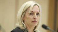 Former Australia Post boss blasts 'irresponsible' ex-PM over watch saga