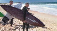 Friends of the man killed in a shark attack in Sydney's Northern Beaches last week have returned to the scene to conquer their fear.