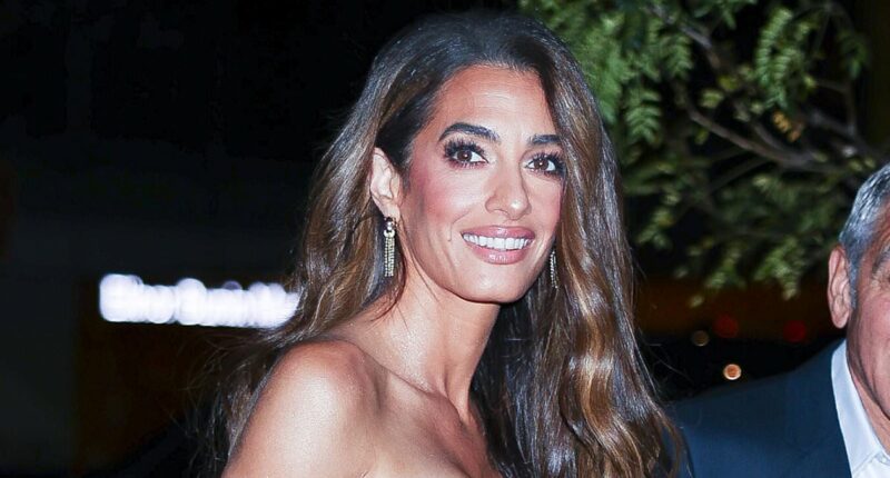 George Clooney's wife Amal wows in floral frock at Jay Kelly premiere