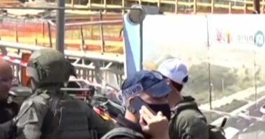 Gunmen kill at least five people at Jerusalem bus stop