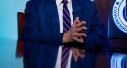 He's the budget scorekeeper for Congress. Lately, it's been a tough job