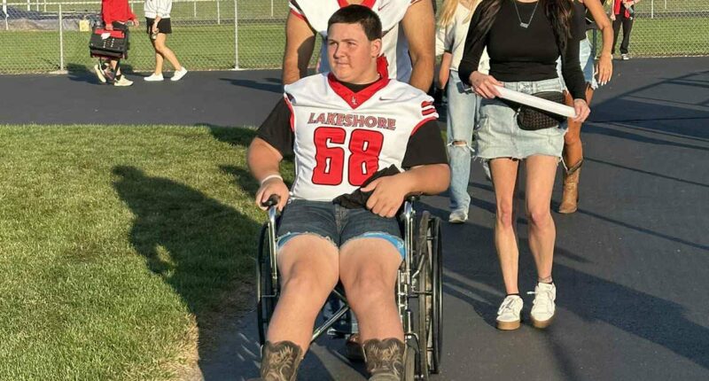 High school football player whose spine was fractured by rival returns