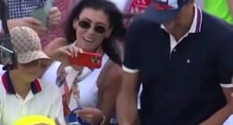 How tennis CEO's wife helped him in infamous hat-grab - but was she even aware? Millionaire took cap from boy and put it in his partner's bag... years after she turned him into huge fan of the sport