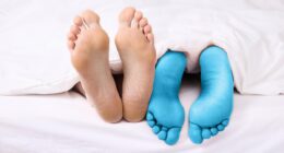 How to end the duvet wars! Medical experts reveal why women are always freezing cold while men feel boiling hot - and what you can do about it