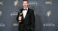 Jimmy Kimmel says he's not defending democracy. But he's standing up for fellow Emmy nominee Colbert