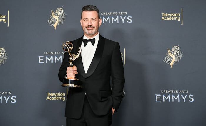 Jimmy Kimmel says he's not defending democracy. But he's standing up for fellow Emmy nominee Colbert