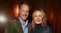 Kim Cattrall, 69, makes rare public appearance with boyfriend Russell Thomas, 54, at Jimmy Choo event after stoking Sarah Jessica Parker feud by weighing in on claims she 'carried' Sex and the City