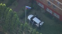 A Victorian man has been charged, accused of acting erratically at the Russian Consulate in Sydney's east before ploughing a car through the gates.