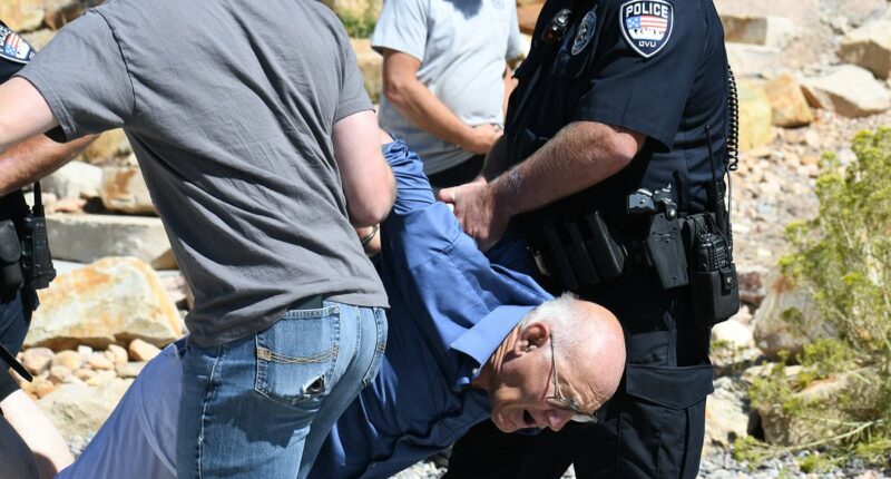 Man hauled away after Charlie Kirk shooting was political agitator