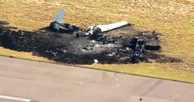 Midair plane crash kills one person near Colorado airport as both planes catch fire