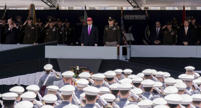 President Trump stands alongside Lieutenant General Steven W. Gilland during the United States Military Academy commencement ceremonies in West Point, N.Y., on May 24, 2025. (Adam Gray, Associated Press)