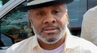 Bryan Hooper Sr. wearing dress shirt and hat