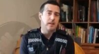 Moment British cops tell American woman to apologise for online posts