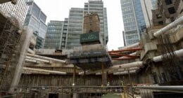 Moment historic London church is lifted 45 feet