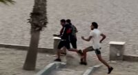 Moment migrants arrive on Spanish beach 'before running through hotel'