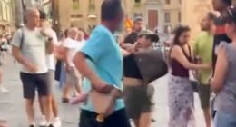 Moment 'pickpocket' is grabbed by the hair by irate husband