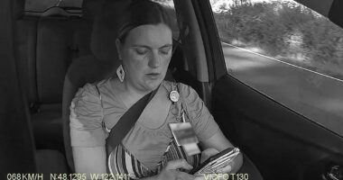 Moment woman texting while driving crashes rental car