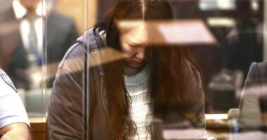 Hakyung Lee stands in the dock at the High Court in Auckland, New Zealand, Monday, Sept. 8, 2025. (Lawrence Smith/Stuff Pool Photo via AP)