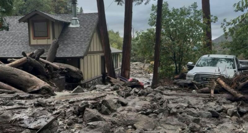 Mudslides trap drivers, bury roads and damage homes in southern California