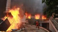Nepal's prime minister resigns as rioters burn leaders' homes