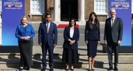 Home Secretary Shabana Mahmood, centre, poses with U.S. Homeland Security Secretary Kristi Noem, Canada's Public Safety Minister Gary Anandasangaree, Australia's Home Affairs Minister Tony Burke and New Zealand's Attorney General Judith Collins at the opening of a "Five Eyes" security alliance summit in central London